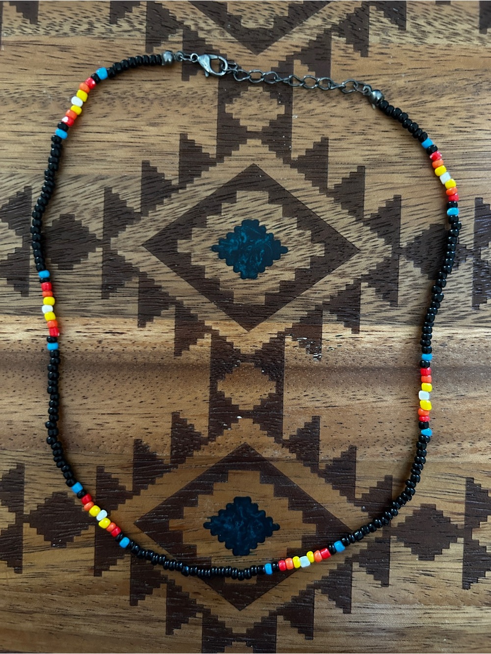 Black Seed-Bead Necklace with Red, Yellow & Blue Accents